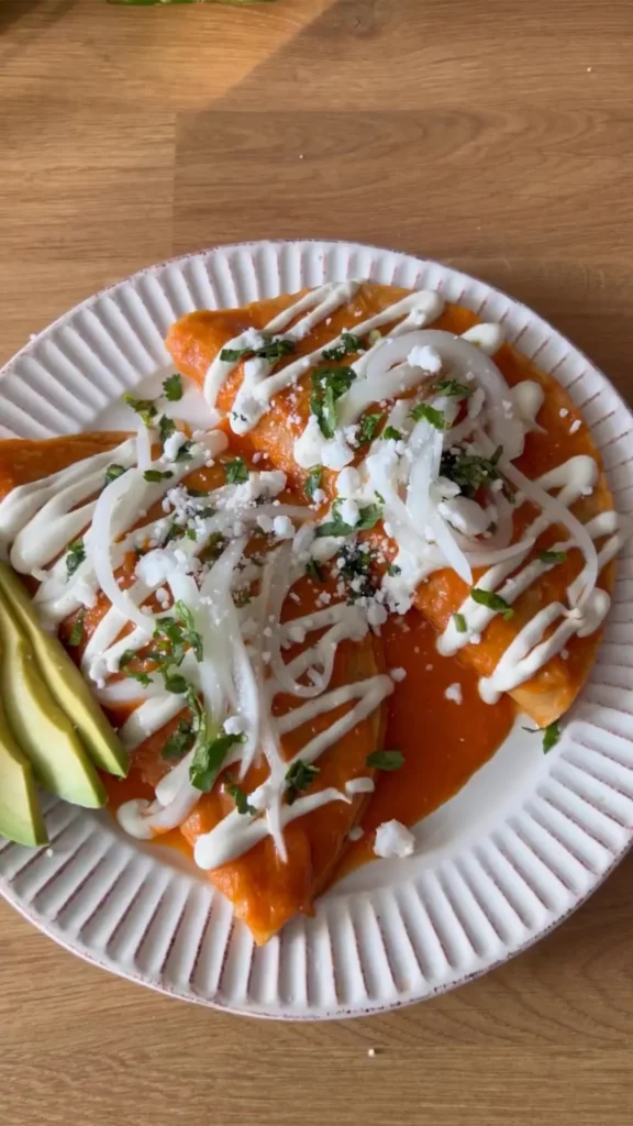 Entomatadas - a classic Mexican dish similar to enchiladas but uses a tomato based sauce